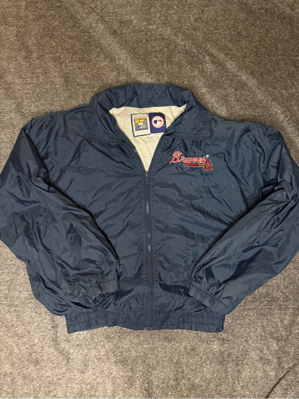 Genuine Merchandise Navy Blue Atlanta Braves Puffer Jacket